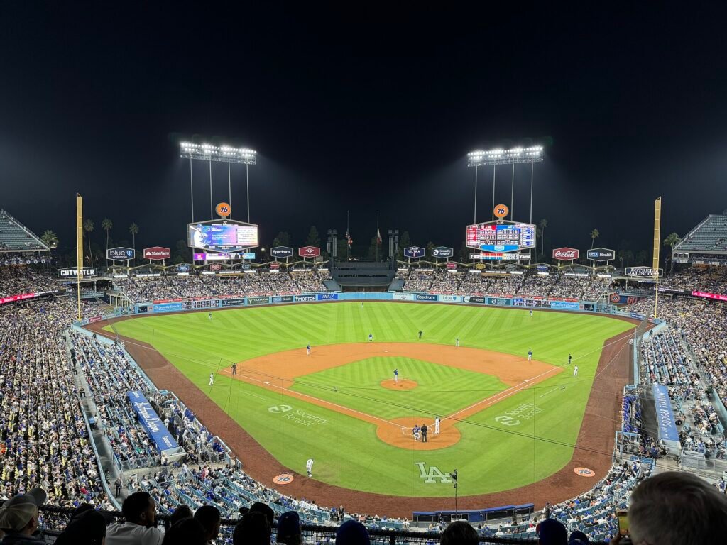Night baseball game at a full stadium