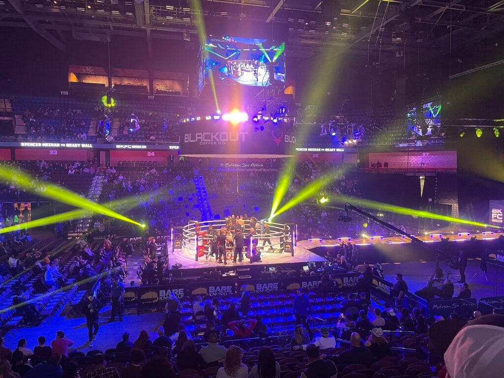 Boxing ring under arena lights